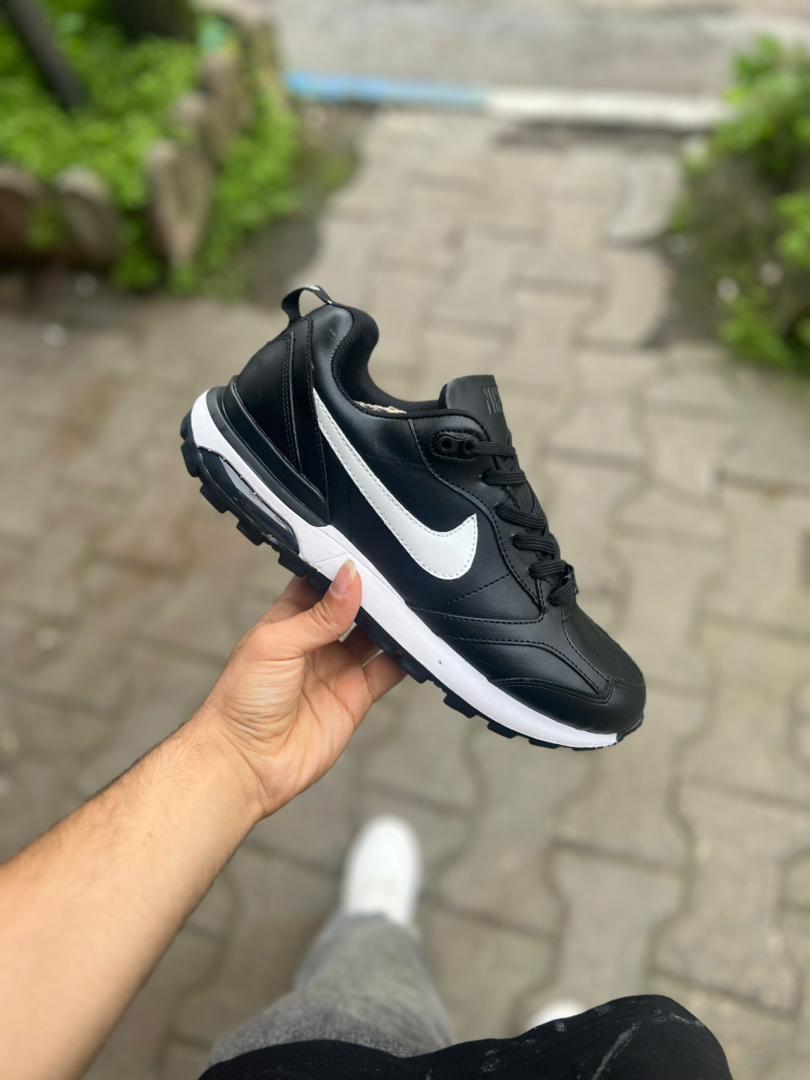 b9759122-73a2-44ae-bdf3-170dc89a0206 نایک مشکی چرم کپسولی(۵۸۲) - Image 1